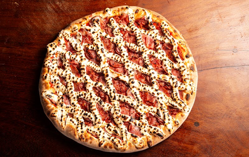 pizza lucs BBQ chicken pizza with red onion